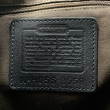 Coach designer travel