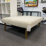 Fabric and wood Ottoman