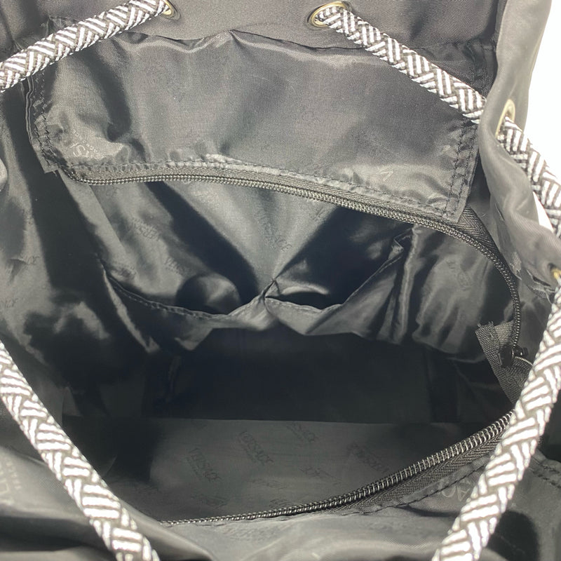 Versace designer travel