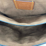 Coach designer travel