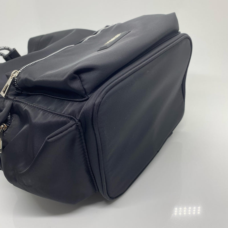 Versace designer travel