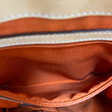 Coach designer travel