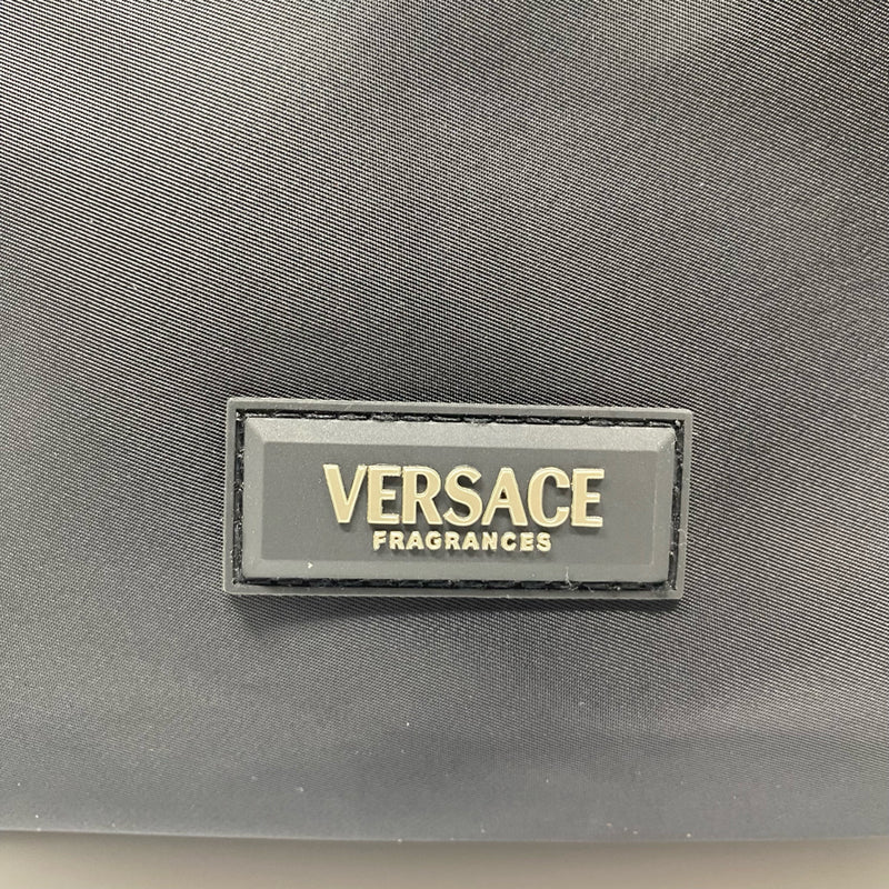 Versace designer travel