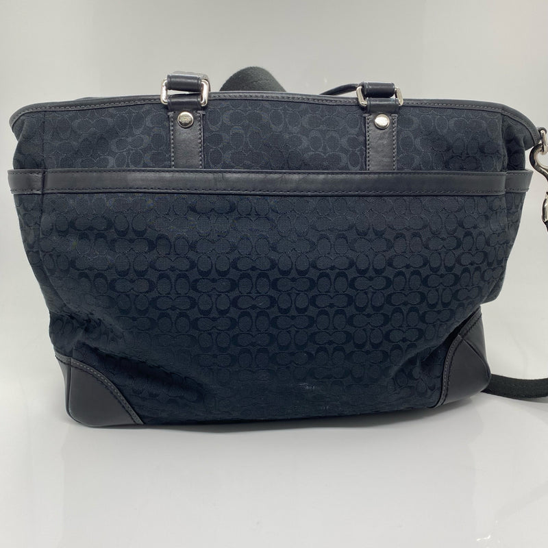 Coach designer travel