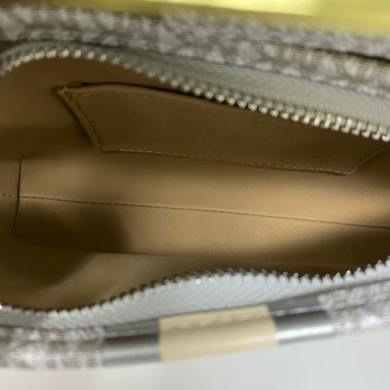 Michael Kors designer travel