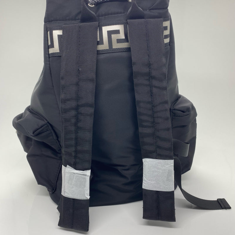 Versace designer travel