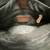 Coach designer travel