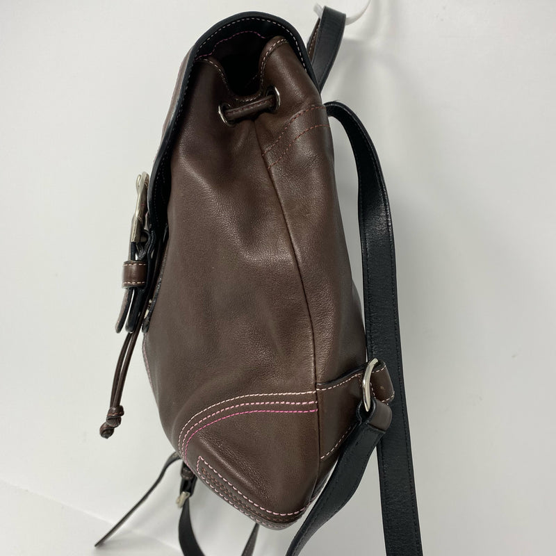 Coach designer travel