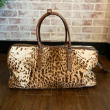 TUMI designer travel