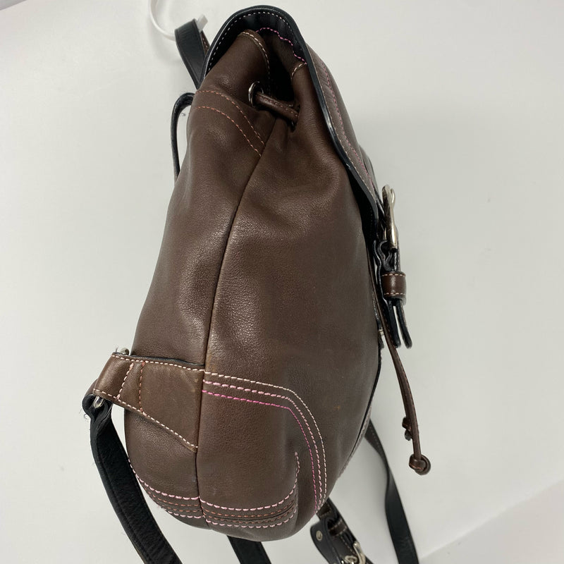 Coach designer travel