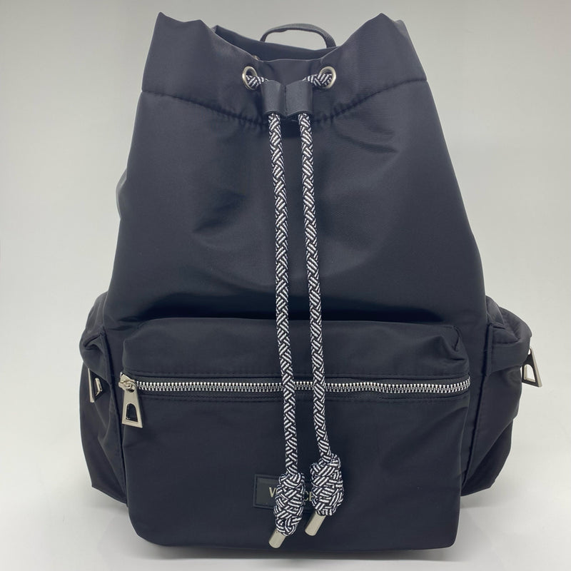 Versace designer travel