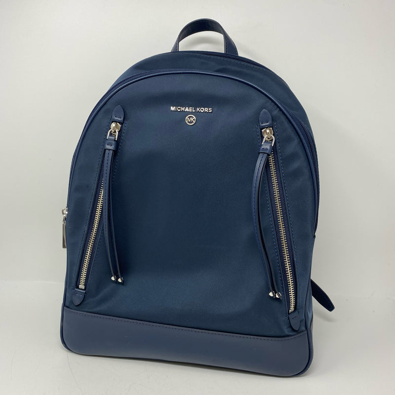 Michael Kors designer travel
