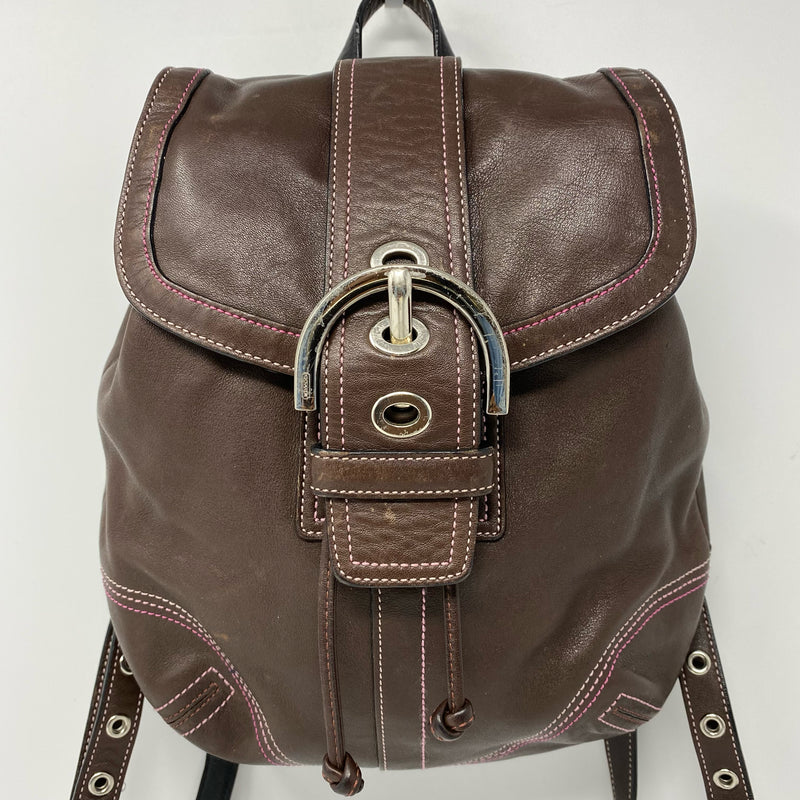 Coach designer travel