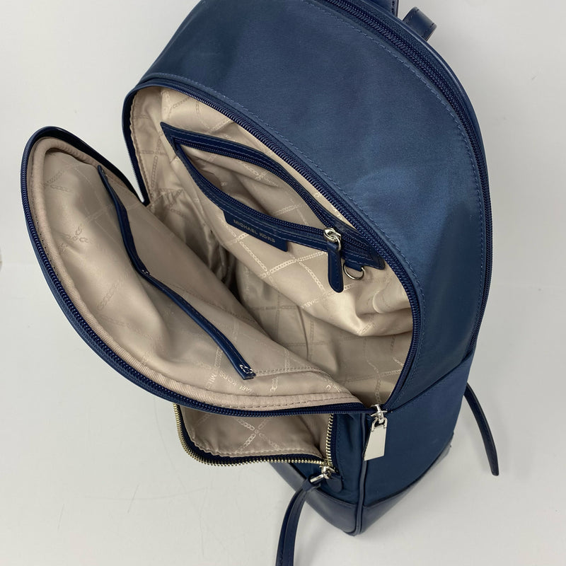 Michael Kors designer travel