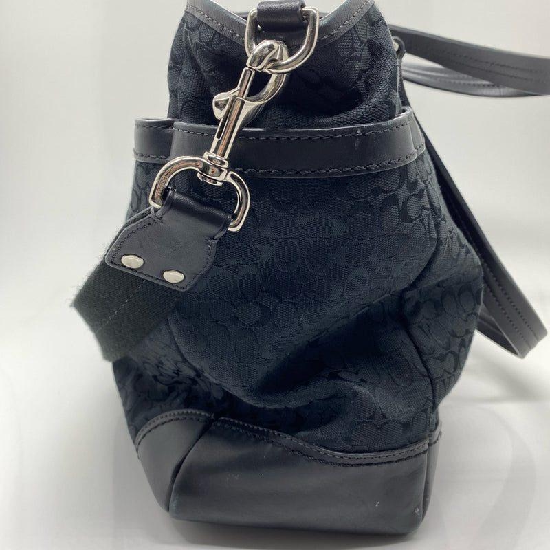 Coach designer travel