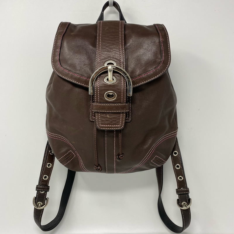 Coach designer travel