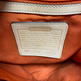 Coach designer travel